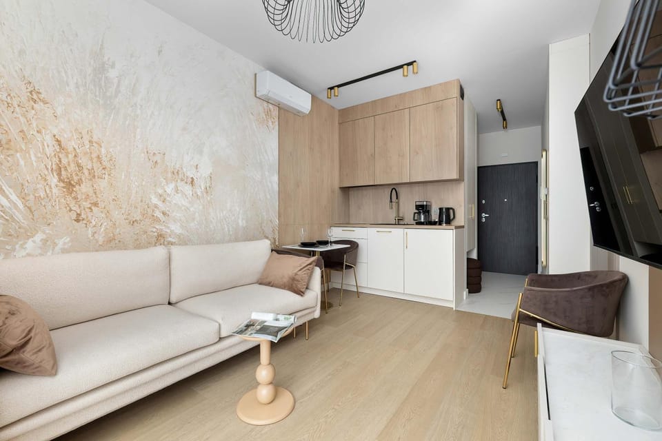 Coffee/tea facilities, Kitchen or kitchenette, Living room, Seating area, Dining area, oven, stove, air conditioner
