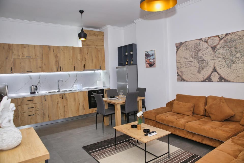 Kitchen or kitchenette, Living room, Seating area, Dining area