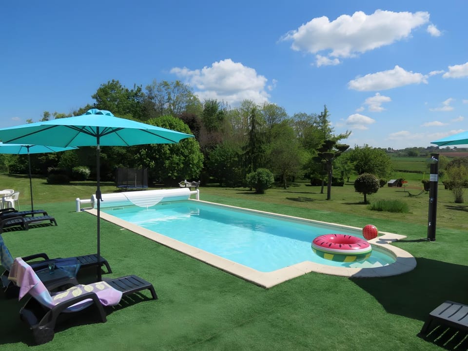 Property building, Living room, Swimming pool
