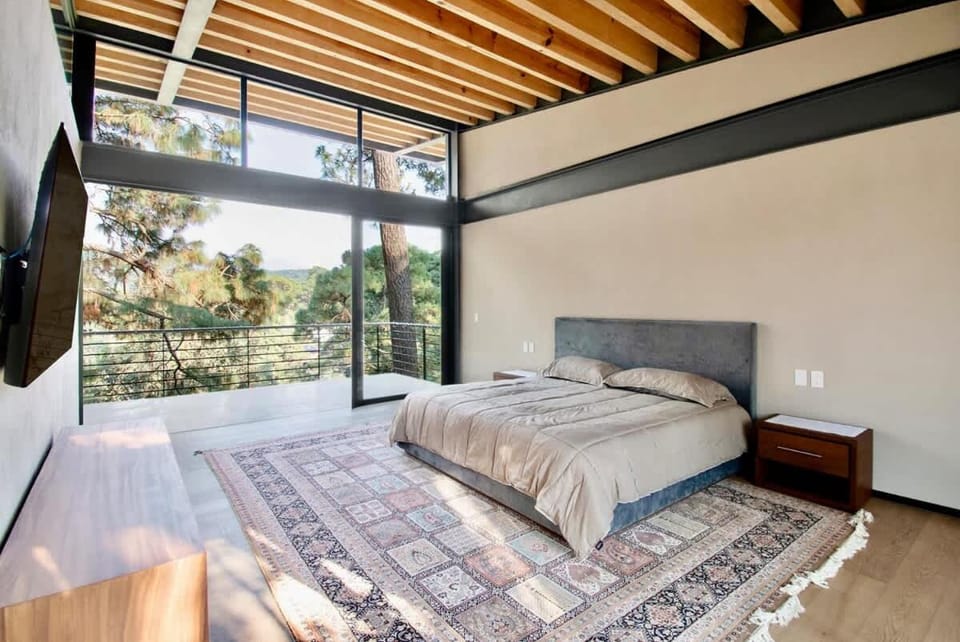 Architectural glass masterpiece villa in Avandaro Forest House in Valle de Bravo