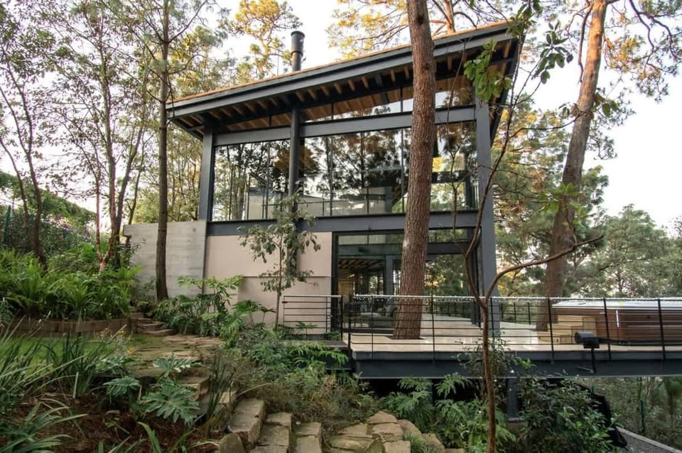 Architectural glass masterpiece villa in Avandaro Forest House in Valle de Bravo