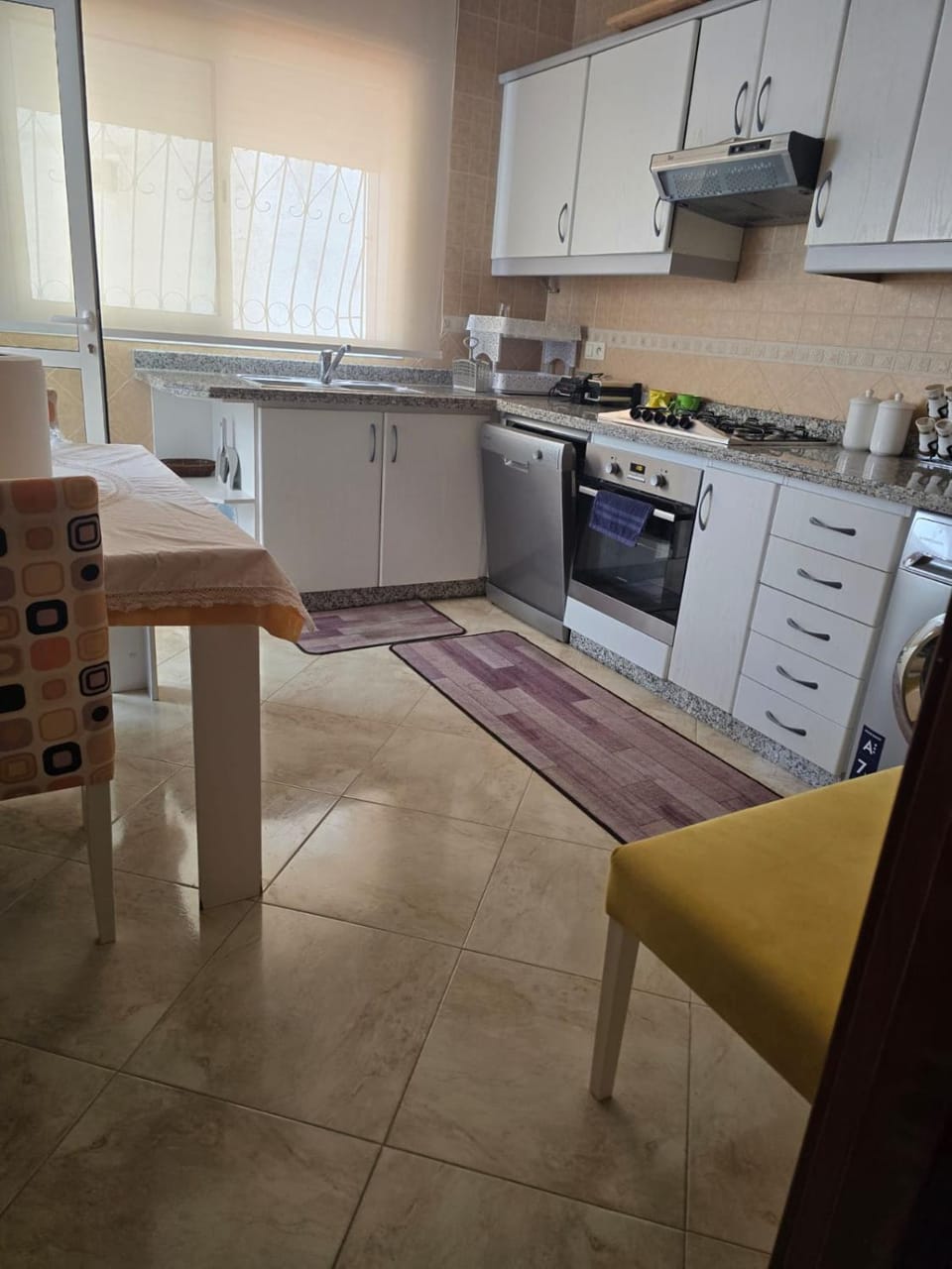 Kitchen or kitchenette, Dining area, dishwasher, oven, stove, toaster