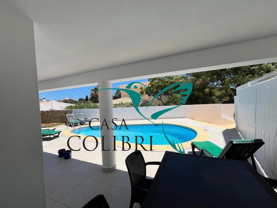 Property building, Living room, Swimming pool