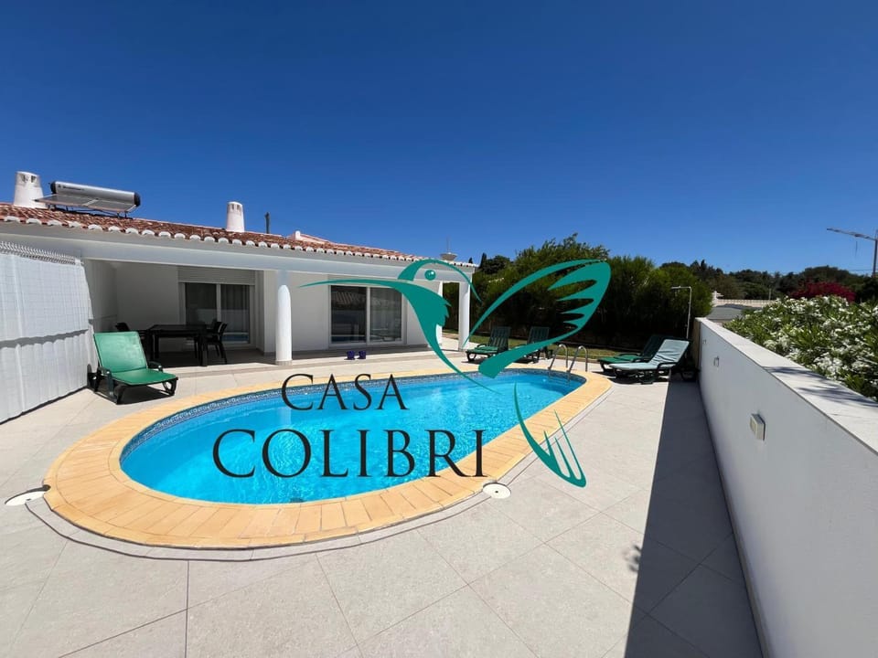 Property building, Living room, Swimming pool