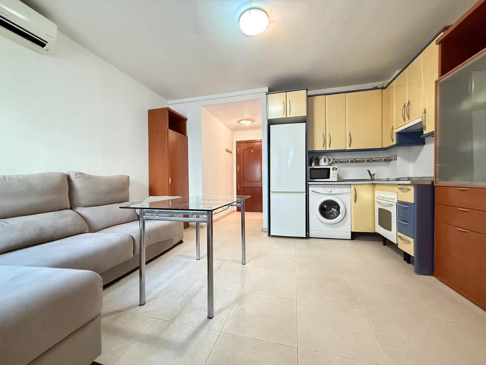 Kitchen or kitchenette, Living room, oven, stove, washing machine