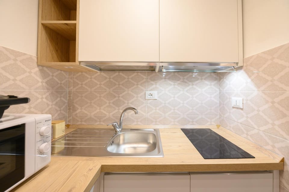 Kitchen or kitchenette, stove