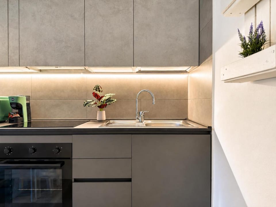Kitchen or kitchenette, stove