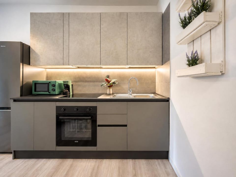 Kitchen or kitchenette, oven, stove