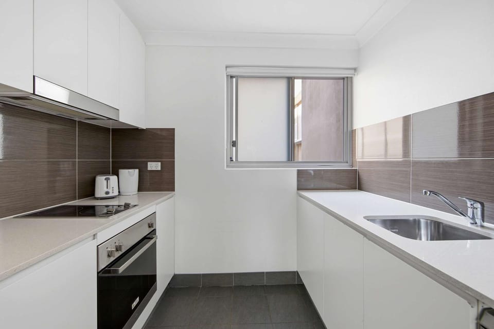 Kitchen or kitchenette, oven, stove, toaster