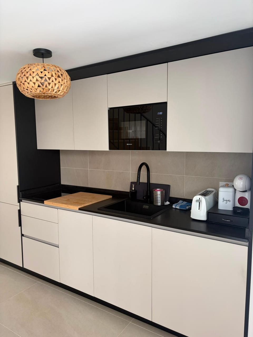 Kitchen or kitchenette, stove, toaster
