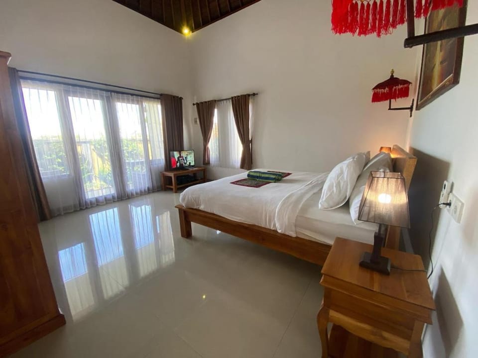 Putra Tropical garden Villa by Best Living Villa in Sukawati