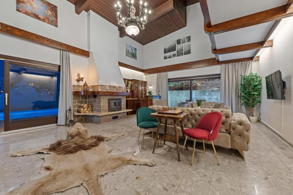 Living room, Seating area, Pool view