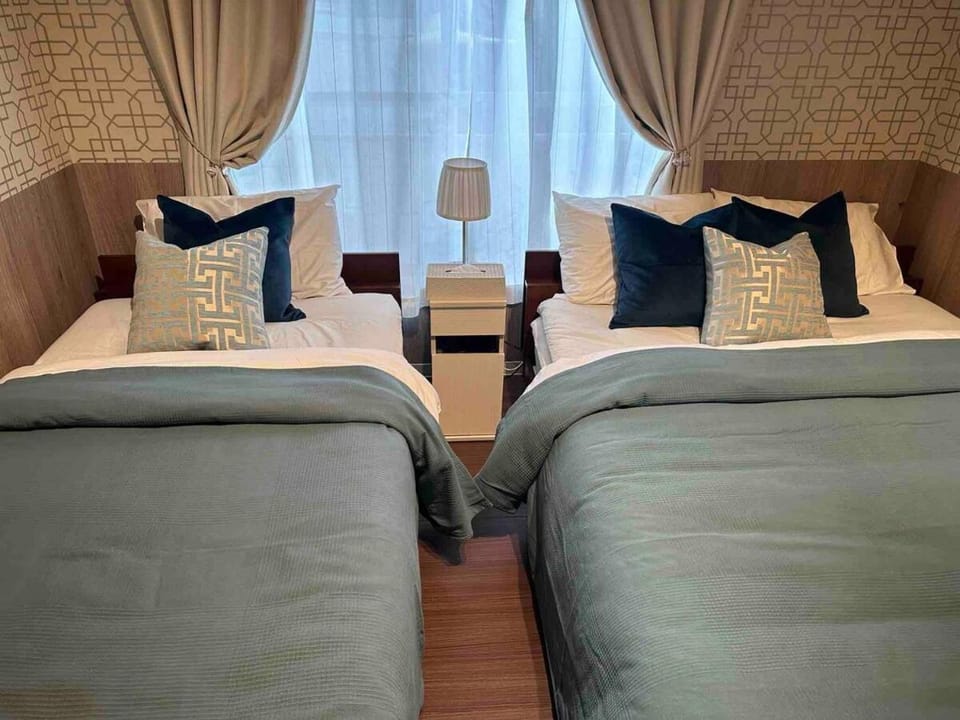 Popular location, 2 stops to Namba, 4 bedrooms, ideal as a base for sightseeing Apartment in Osaka