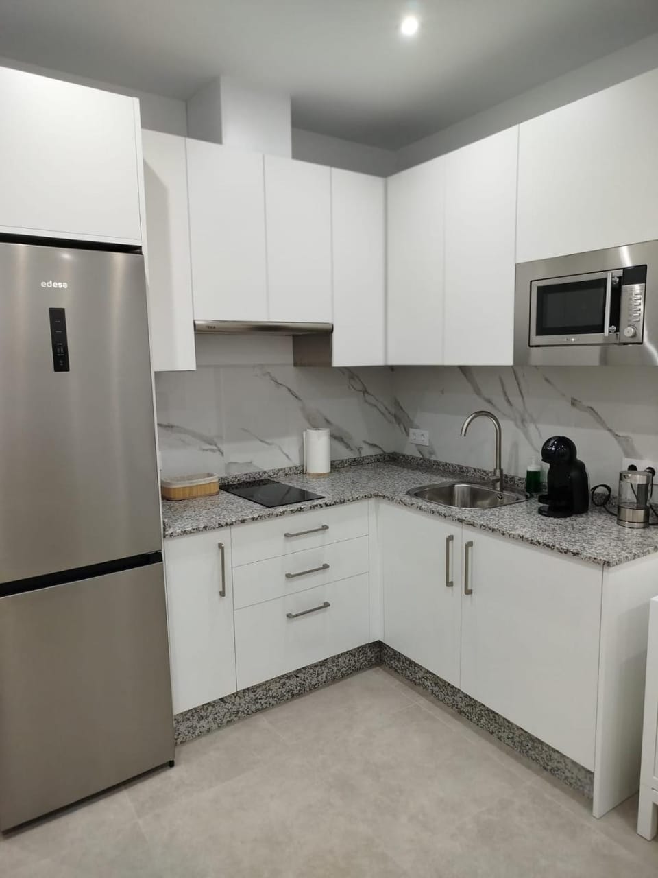 Kitchen or kitchenette, stove, toaster