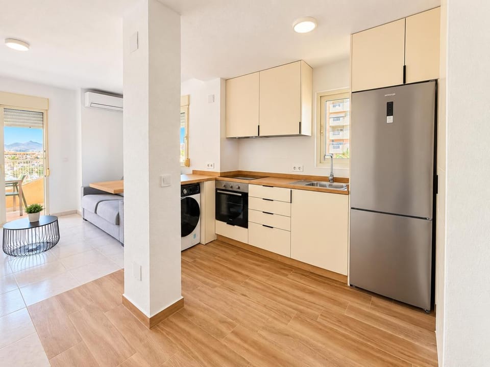 Kitchen or kitchenette, Dining area, oven, stove, washing machine