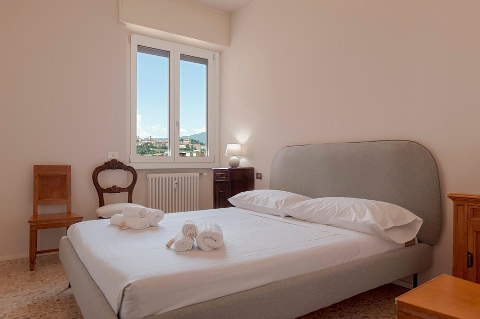 Bed, Photo of the whole room, Bedroom, towels, air conditioner