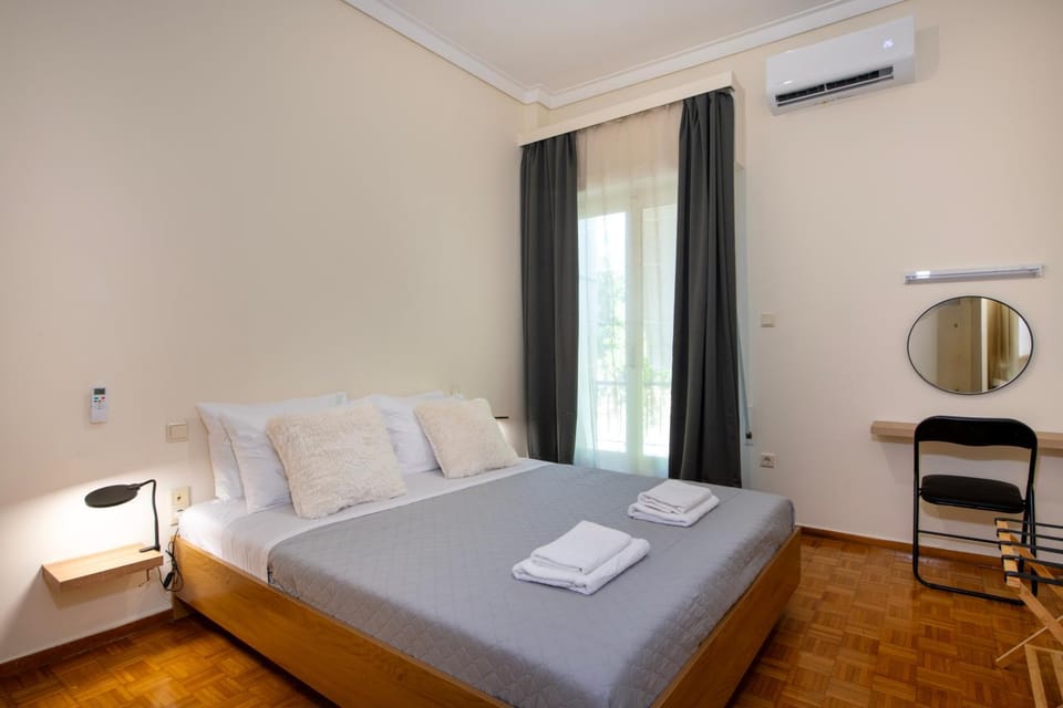 Bed, Photo of the whole room, Bedroom, towels, air conditioner