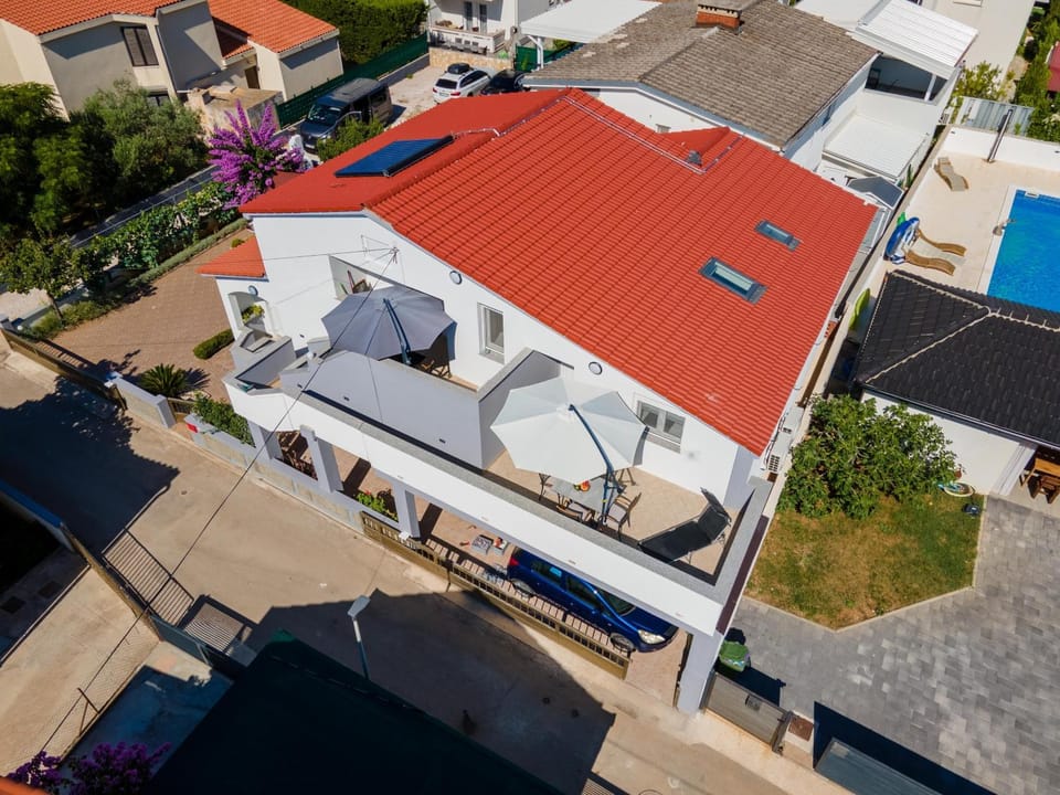 Property building, Living room, Swimming pool