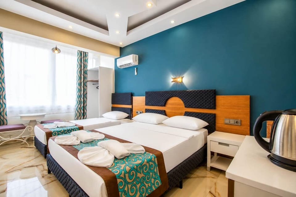 Bed, Bedroom, towels, air conditioner