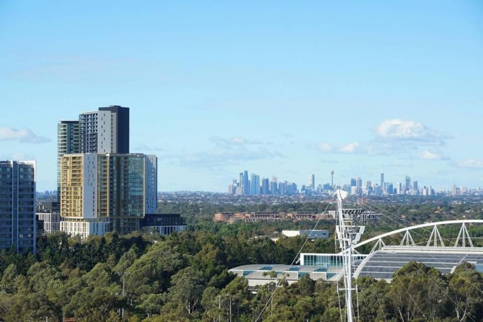 Luxurious Pool View at Sydney Olympic Park Apartment in Lidcombe