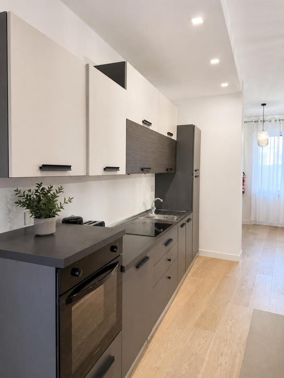 Kitchen or kitchenette, oven, stove
