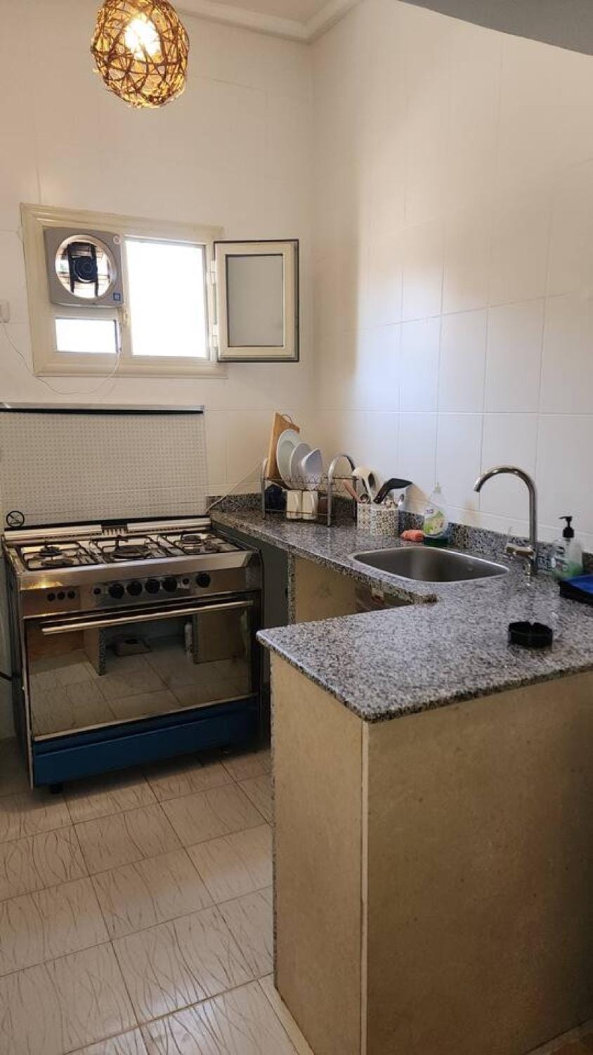 Kitchen or kitchenette, stove