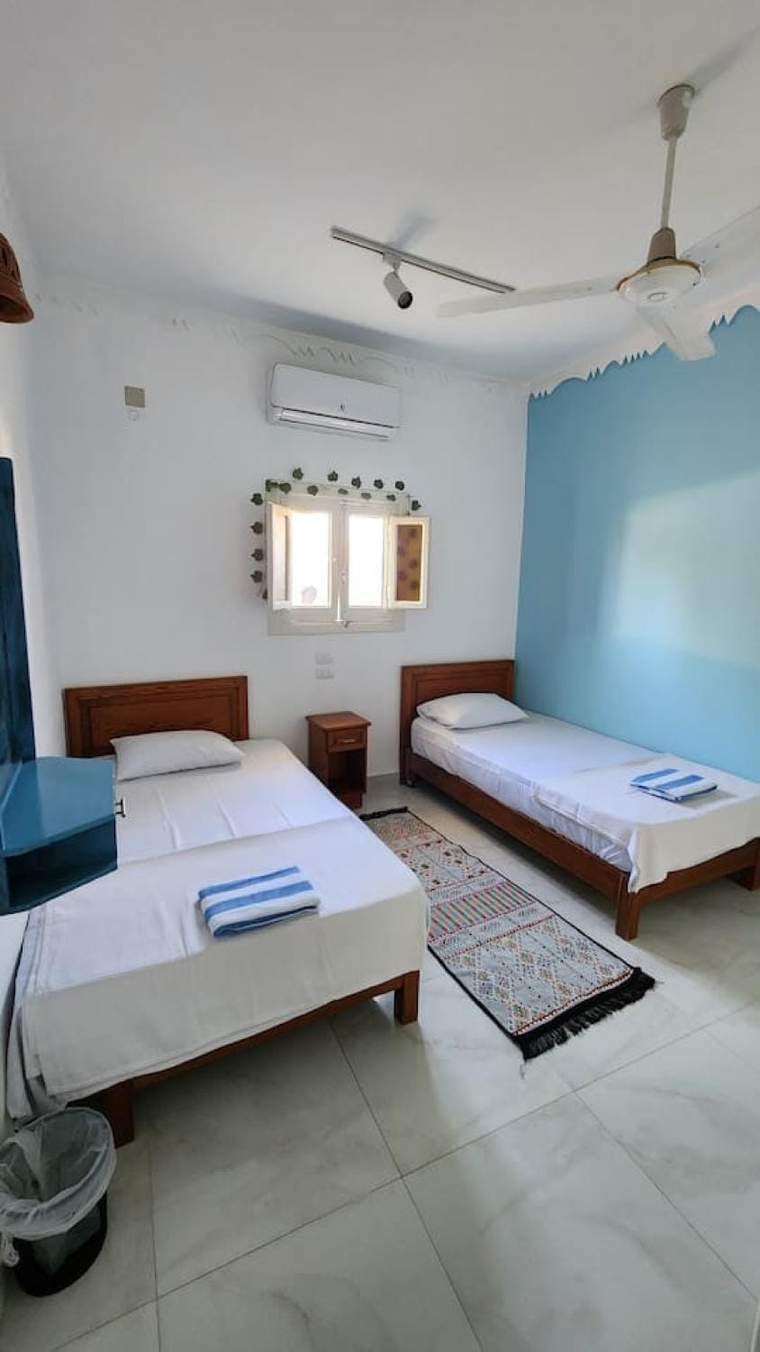 Bed, Photo of the whole room, Bedroom, towels, air conditioner