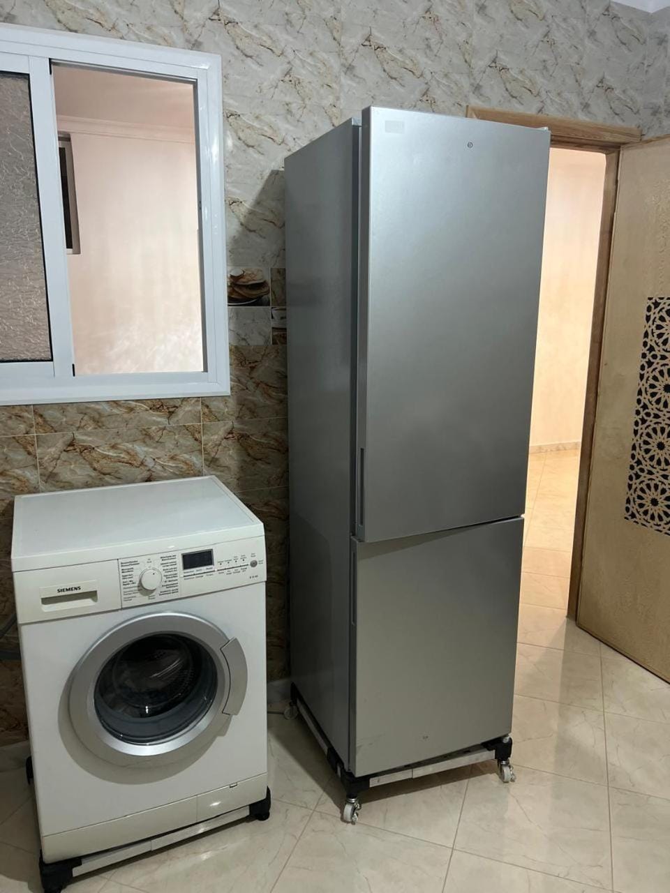 Kitchen or kitchenette, washing machine