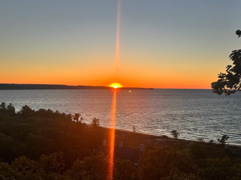 Condo in Glen Arbor with Lake Michigan sunset views fireplace deck washer & dryer House in Sleeping Bear Dunes