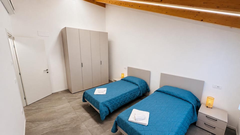 Bed, Photo of the whole room, Bedroom, towels, wardrobe
