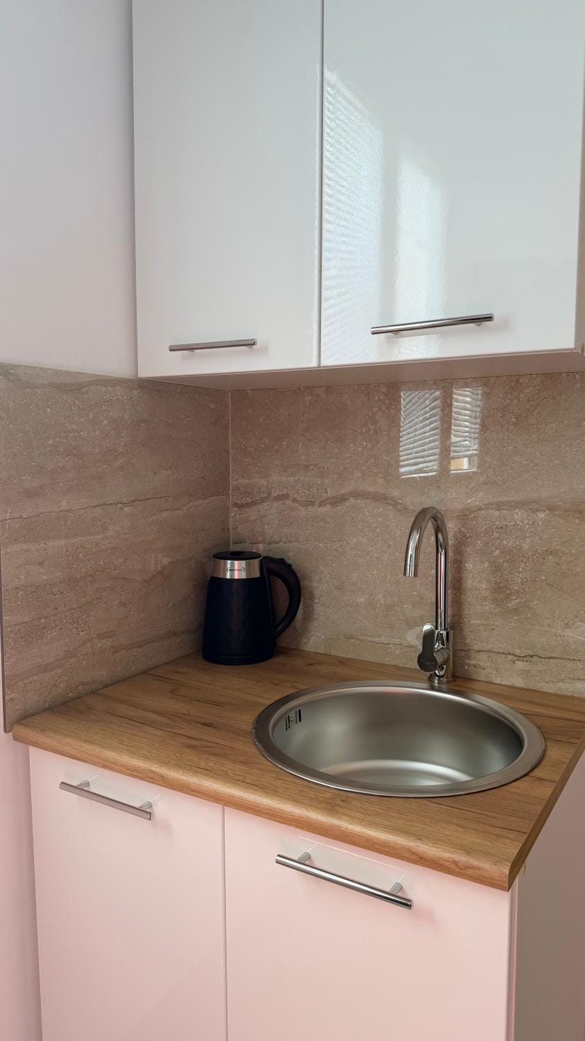 Kitchen or kitchenette, stove