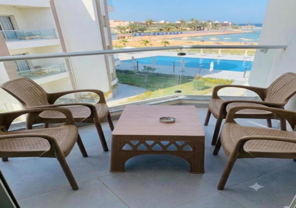 Patio, Day, Natural landscape, View (from property/room), Balcony/Terrace, Balcony/Terrace, Living room, Seating area, Dining area, Pool view, Sea view, Swimming pool, sunbed