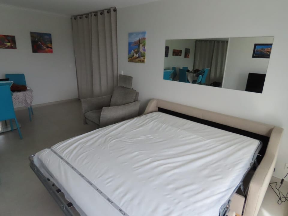 Bed, Living room, Seating area