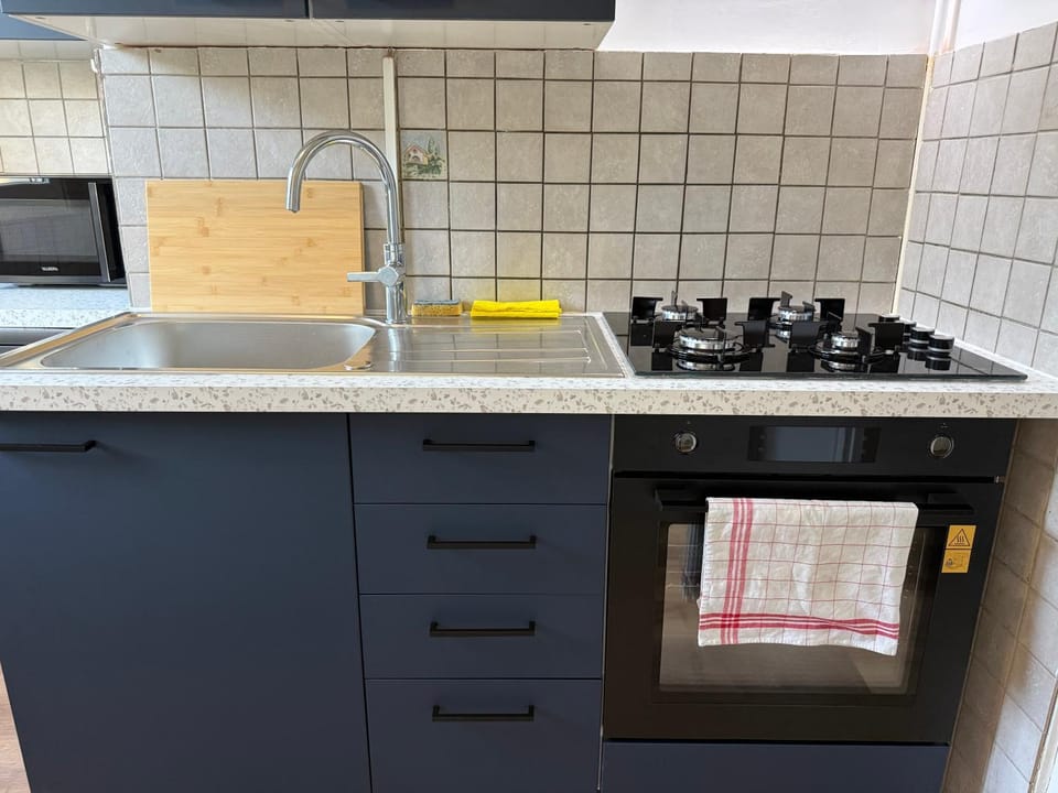 Dining area, microwave, oven, stove, kitchen