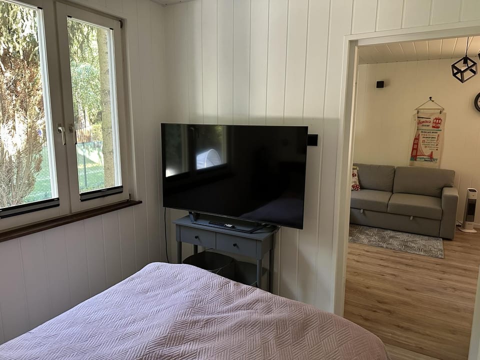 TV and multimedia, Living room, Seating area, Evening entertainment, Bedroom