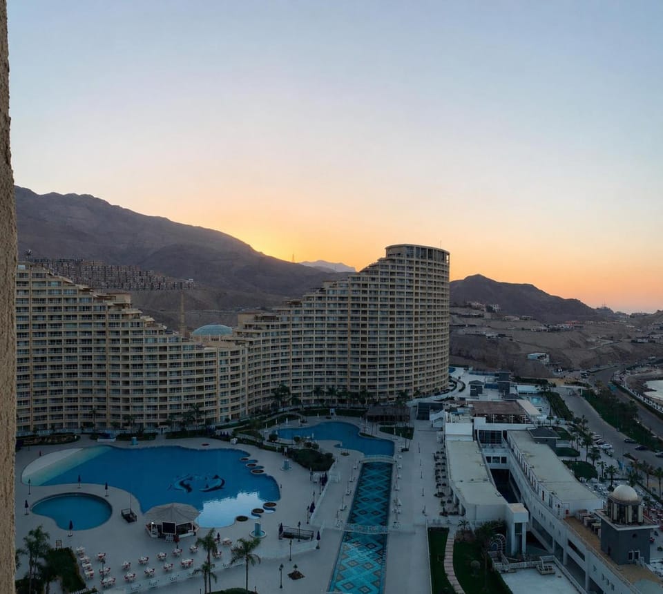 Property building, View (from property/room), Garden view, Mountain view, Pool view, Street view, Swimming pool, Sunset