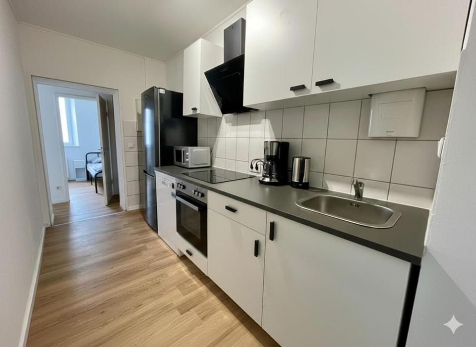 Krefeld HomeBase mit Küche und 5 Einzelbetten Apartment in Krefeld