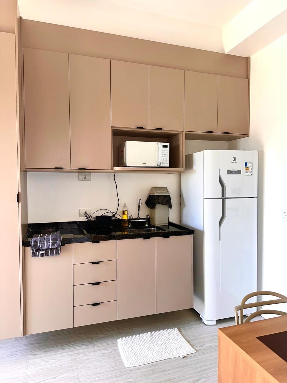 Kitchen or kitchenette, microwave, stove