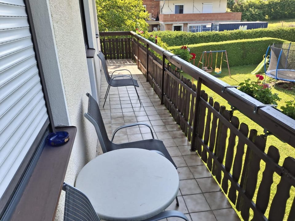 View (from property/room), Balcony/Terrace, Seating area, Garden view
