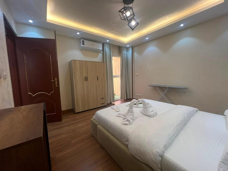Bed, Photo of the whole room, Bedroom, towels, wardrobe, air conditioner