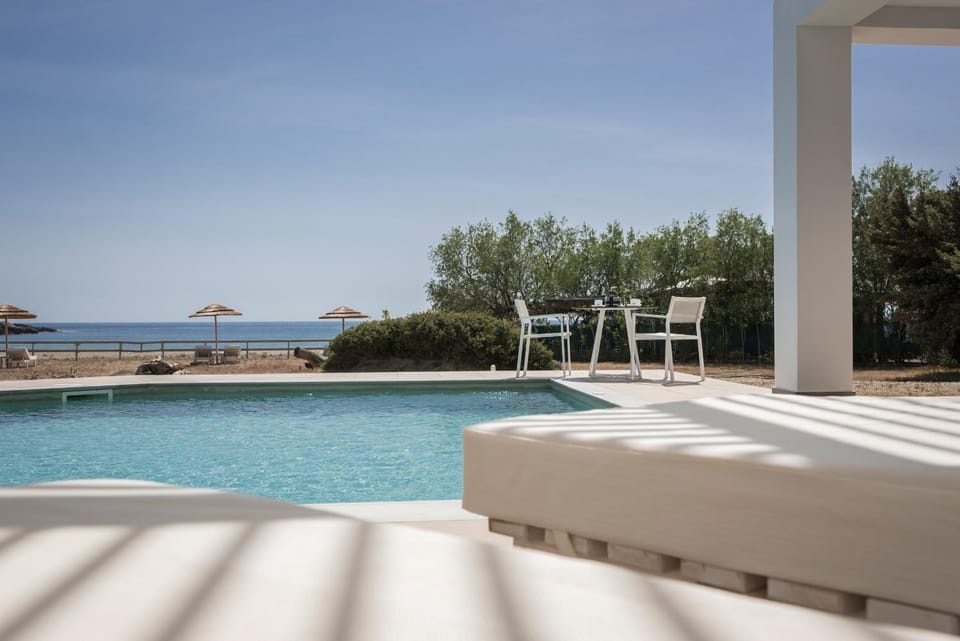 Patio, Natural landscape, Beach, Pool view, Swimming pool, sunbed
