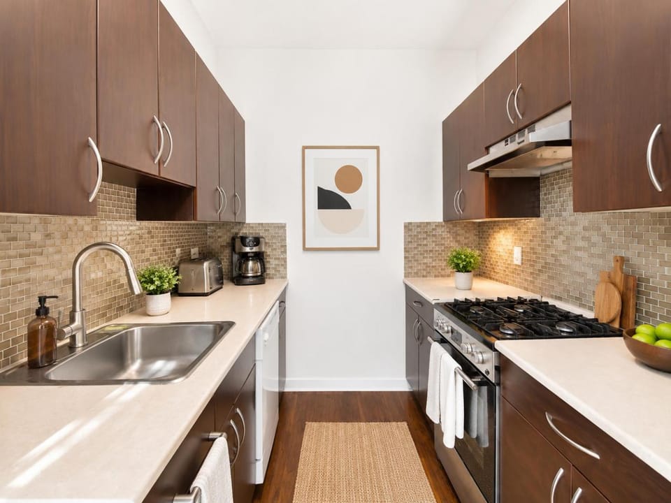 Kitchen or kitchenette, dishwasher, oven, stove, toaster