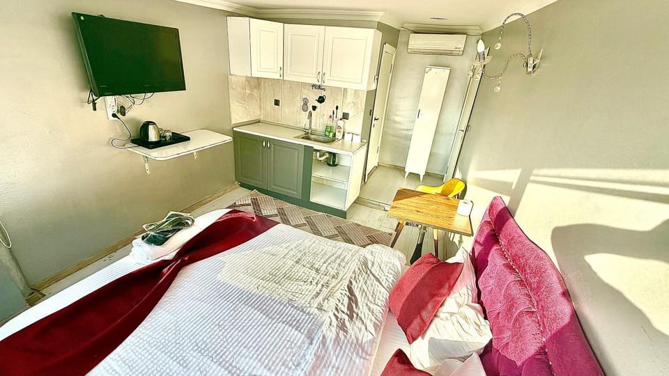 Bed, TV and multimedia, Kitchen or kitchenette, Living room, Photo of the whole room, Seating area, Dining area, Bedroom, minibar, oven, towels