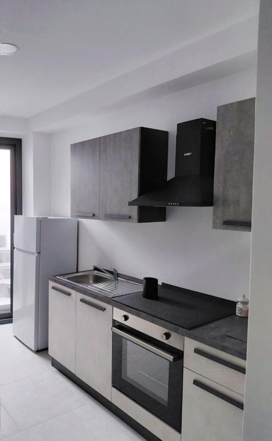 Kitchen or kitchenette, oven