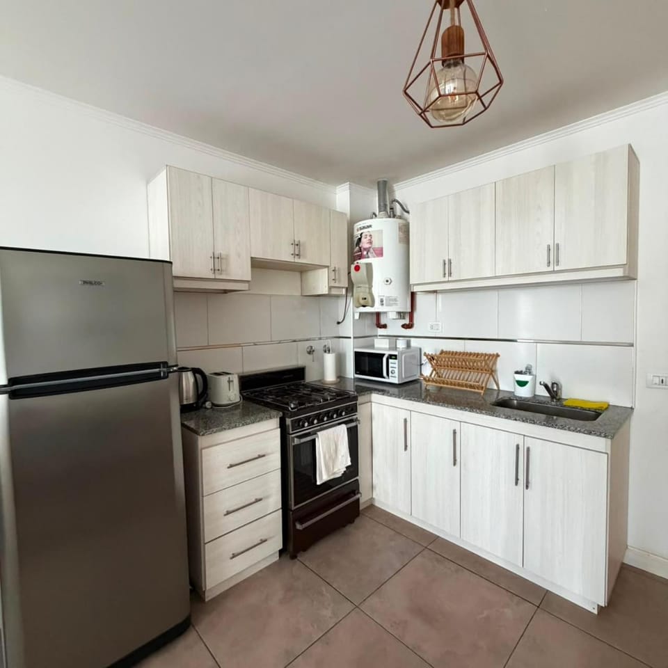 Kitchen or kitchenette, oven, toaster