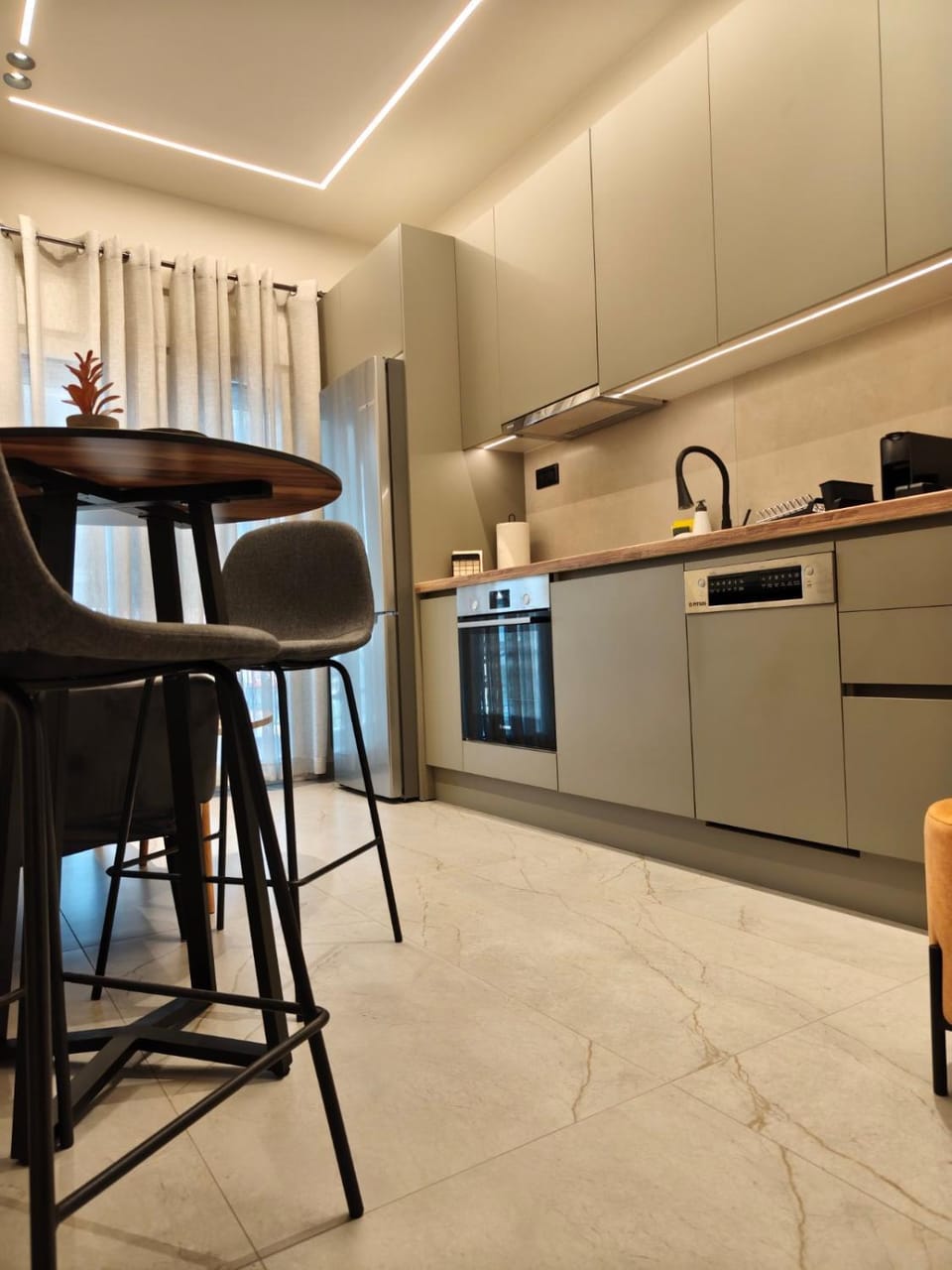 Dining area, dishwasher, oven, stove