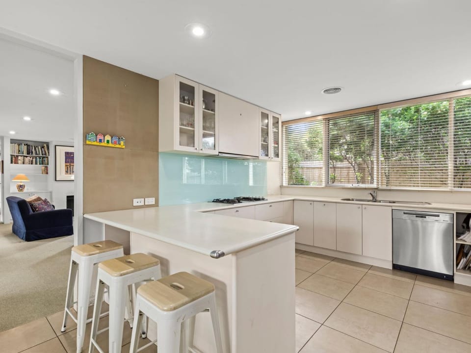 Kitchen or kitchenette, dishwasher, oven, stove, toaster