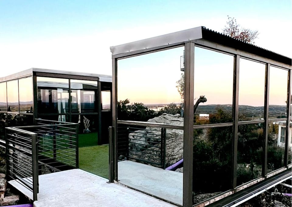 Stunning Mirror-Glass Retreat with Spa Tub & Sunset Deck in Cottonwood, Texas Villa in Cottonwood Shores