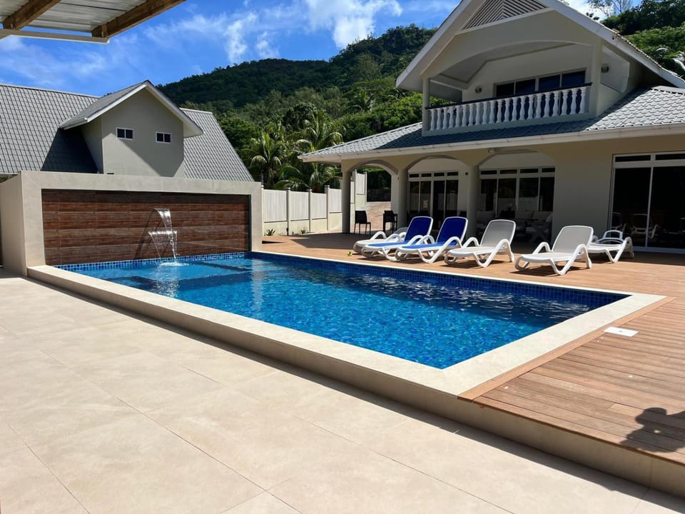 Property building, Pool view, Swimming pool, sunbed
