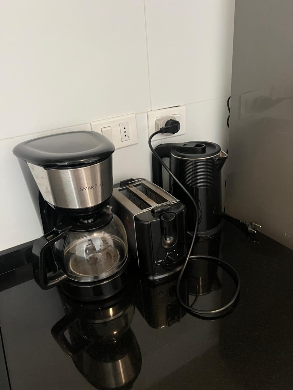 Kitchen or kitchenette, toaster